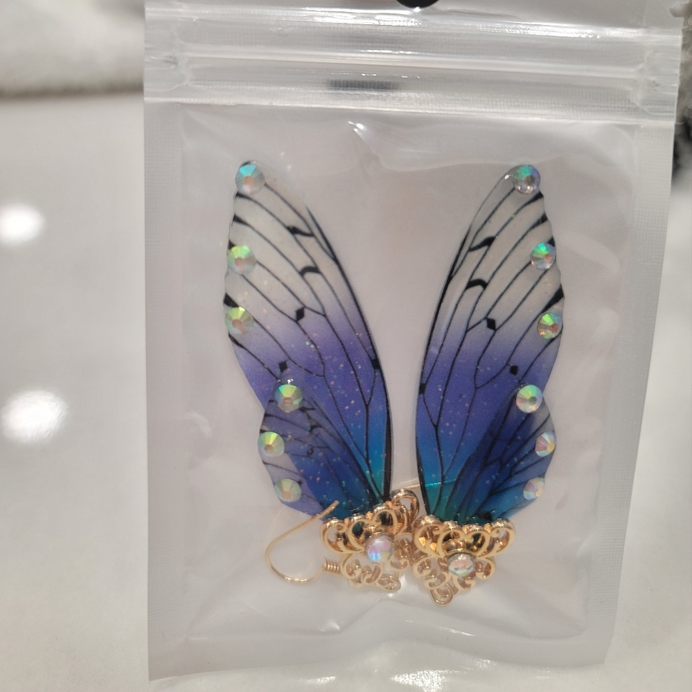 New angel wing earrings. 2.5” long